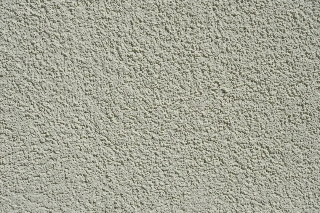a close up of a wall made of cement